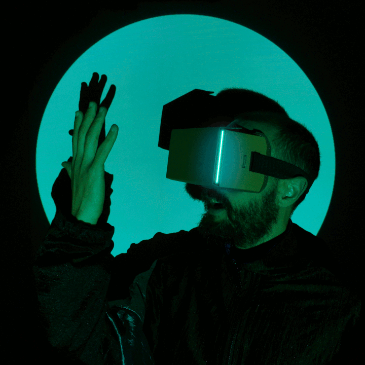 Li Francucci wearing cardboard VR glasses